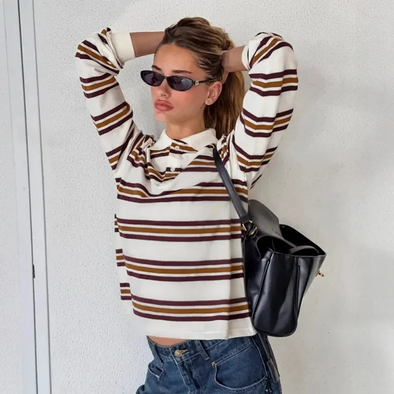 Удобная трикотажная рубашка в контрастную полоску 2225 цветов для женщин, осенняя облегающая футболка с воротником-поло, повседневная универсальная футболка с длинным рукавом
Удобная трикотажная рубашка в контрастную полоску 2225 цветов для женщин, осенняя облегающая футболка с воротником-поло, повседневная универсальная футболка с длинным рукавом