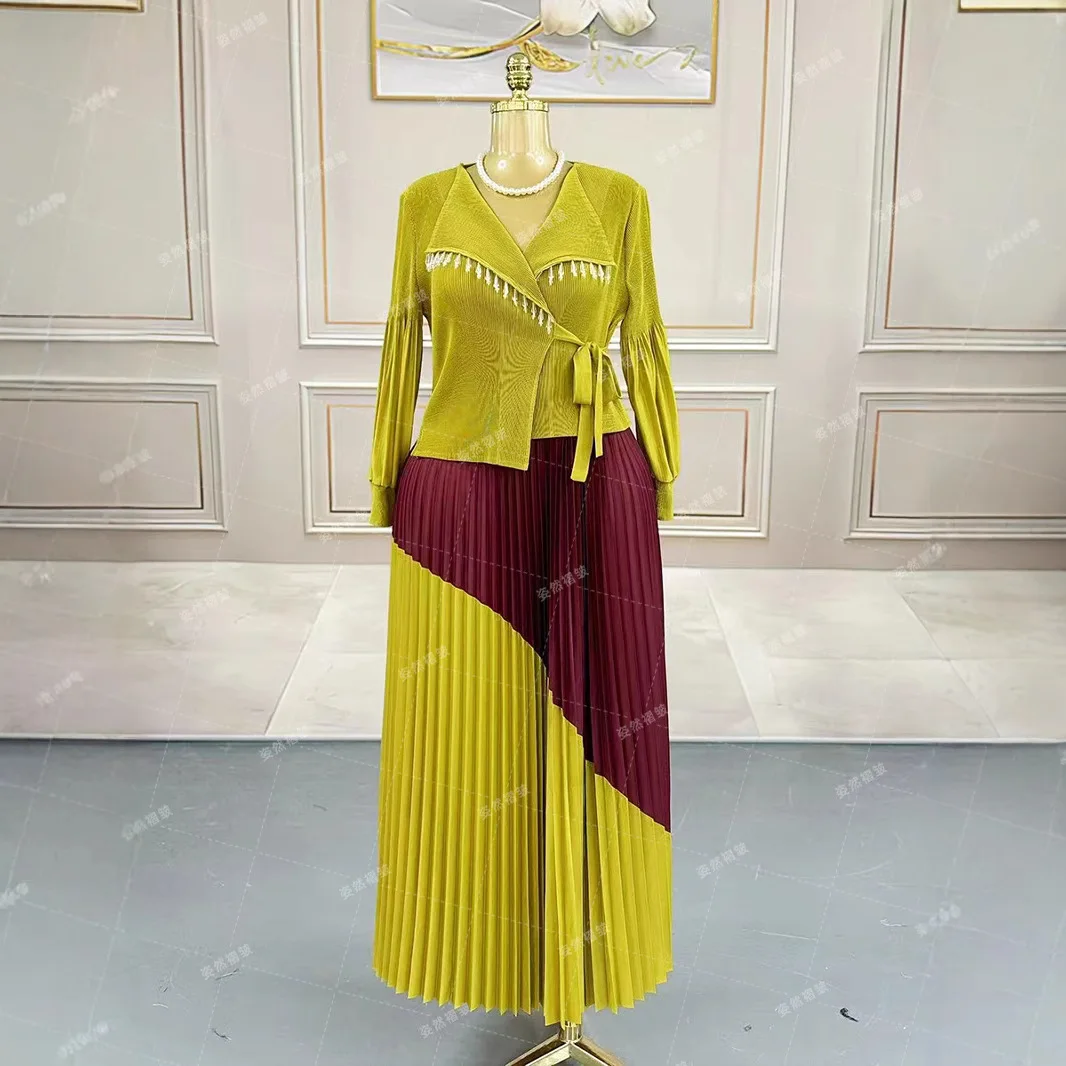 Miyake Pleated Large Size Fake Two-piece Dress for Women 2026 New Color Block Suit Collar Lantern Sleeves Elegant Pleated Skirt
Miyake Pleated Large Size Fake Two-piece Dress for Women 2026 New Color Block Suit Collar Lantern Sleeves Elegant Pleated Skirt