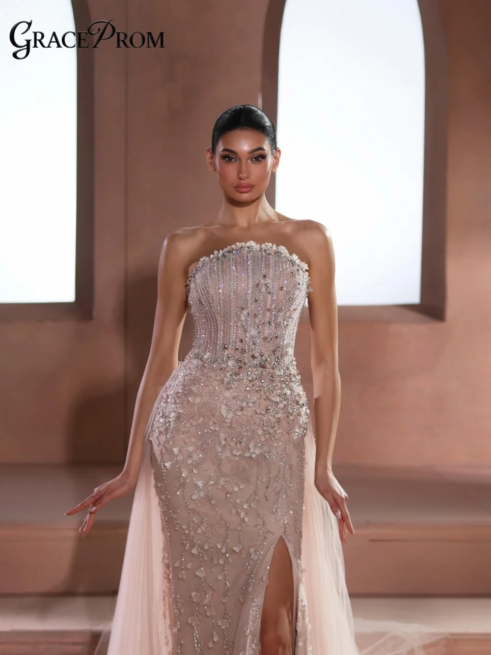 Glimmering Champagne Blush Evening Gown 2026 Polished Tube Neck Dress For Gala With High Slit Tulle Overlay Beading فساتين سهرة
Glimmering Champagne Blush Evening Gown 2026 Polished Tube Neck Dress For Gala With High Slit Tulle Overlay Beading فساتين سهرة