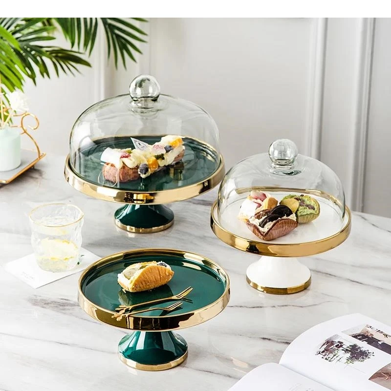 Ceramic Dessert Table Cake Plate with Glass Lid Hotel Restaurant High Foot Fruit Decoration Tasting Home Tableware
Ceramic Dessert Table Cake Plate with Glass Lid Hotel Restaurant High Foot Fruit Decoration Tasting Home Tableware