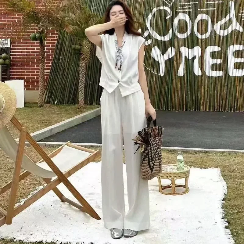 Women Summer White Sleeveless Vest Wide Leg Pants Loose Casual Two Piece Outfit Set
Women Summer White Sleeveless Vest Wide Leg Pants Loose Casual Two Piece Outfit Set