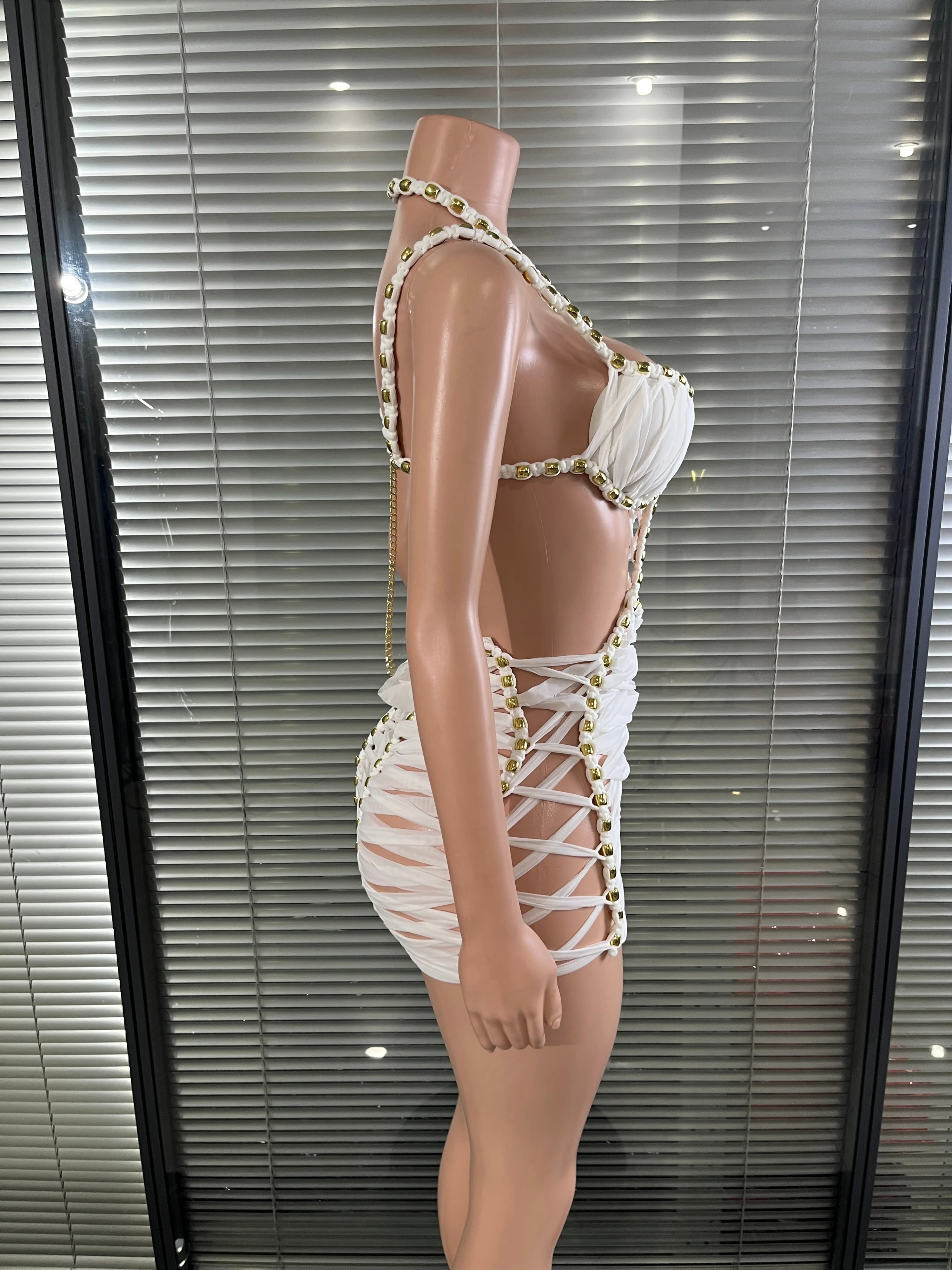 Chic White Braided Bandage Dress with Halter Neck and Gold Bead Detail Versatile for Club, Party, Rave and Night Out Streetwear
Chic White Braided Bandage Dress with Halter Neck and Gold Bead Detail Versatile for Club, Party, Rave and Night Out Streetwear