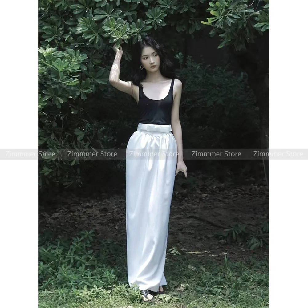 2024 Spring New Black Big U Neck Camisole Tank Top + Half Skirt White Bow Tulip Pod Long Skirt Set
2024 Spring New Black Big U Neck Camisole Tank Top + Half Skirt White Bow Tulip Pod Long Skirt Set