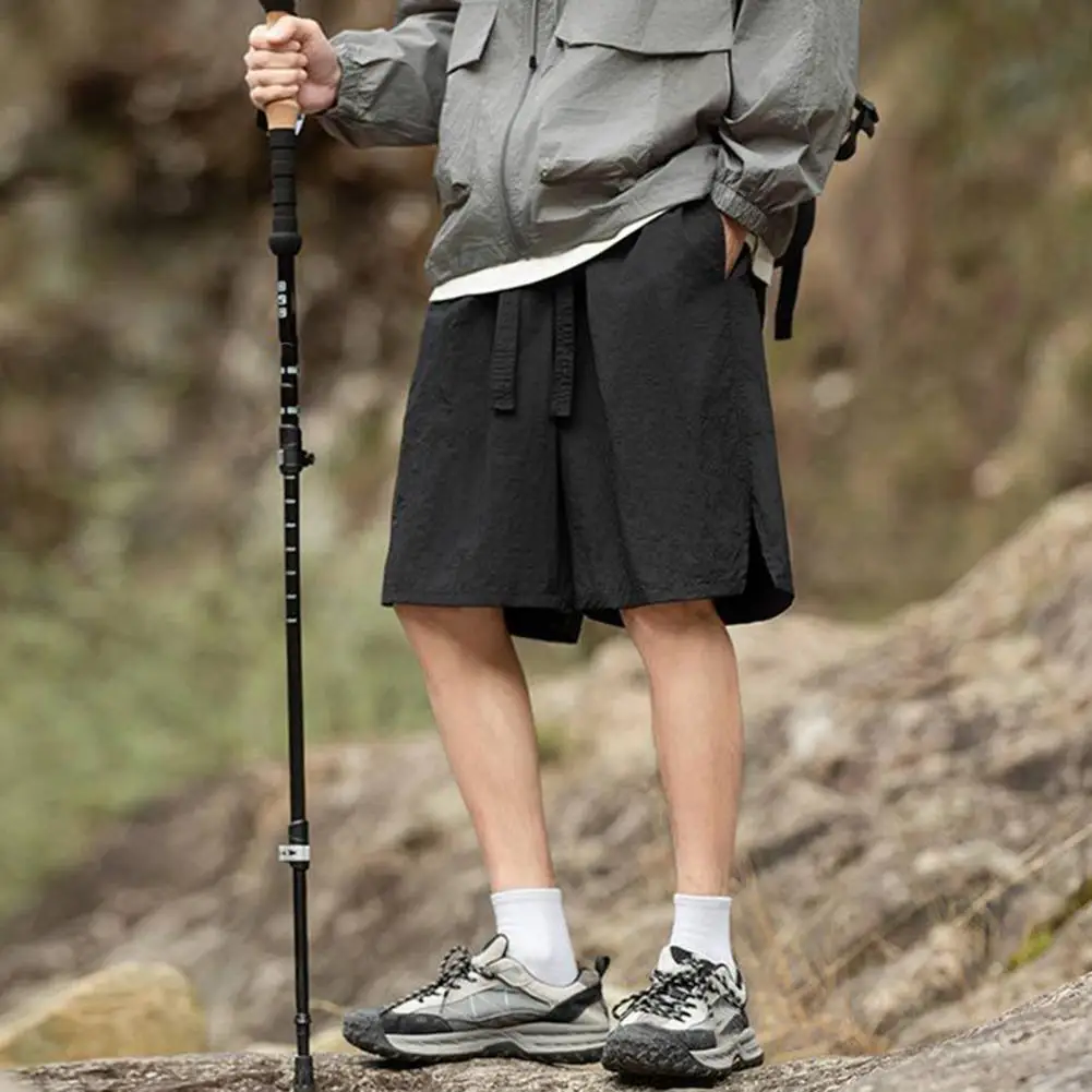 Men Casual Shorts Solid Color Wide Leg Sport Shorts With Pockets Elastic Waist Drawstring Quick-Drying Beach Cargo Shorts
Men Casual Shorts Solid Color Wide Leg Sport Shorts With Pockets Elastic Waist Drawstring Quick-Drying Beach Cargo Shorts