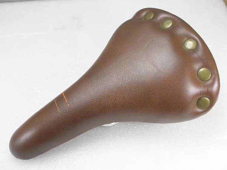 Riveted large spring retro leather cushion seat package comfortable shock absorber seat Old bike saddle
Riveted large spring retro leather cushion seat package comfortable shock absorber seat Old bike saddle