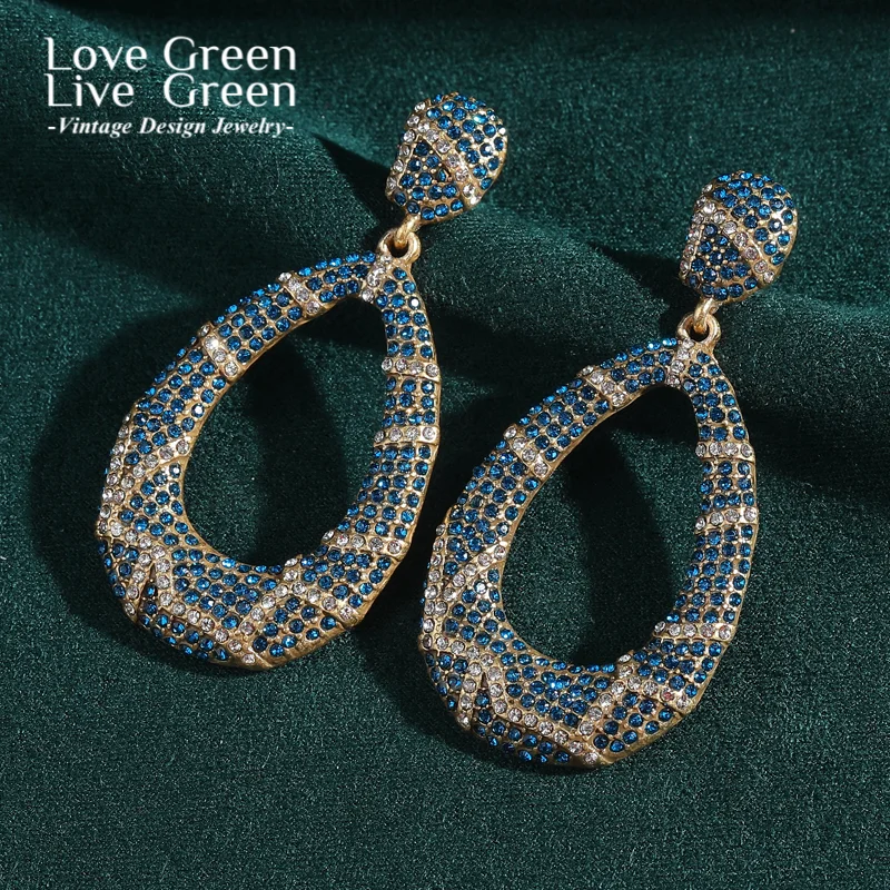 Vintage Large Blue Drop Dangle Earring Hollow Rhinestone Water Droplet Gold Color Luxury Jewelry Designer Quality Wedding 2025
Vintage Large Blue Drop Dangle Earring Hollow Rhinestone Water Droplet Gold Color Luxury Jewelry Designer Quality Wedding 2025