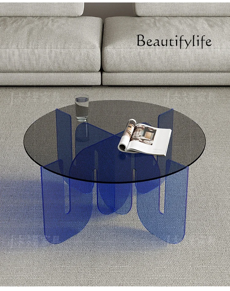 Acrylic transparent glass coffee table Nordic designer personalized creative living room round blue tea table
Acrylic transparent glass coffee table Nordic designer personalized creative living room round blue tea table