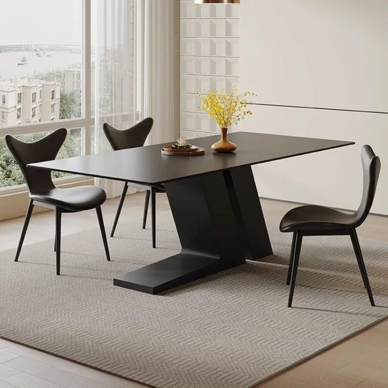 Modern simple black rock slab dining table and chair combination household small apartment dining room rectangular island dining
Modern simple black rock slab dining table and chair combination household small apartment dining room rectangular island dining