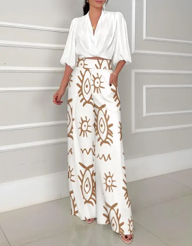 Summer Women's Casual 2-Piece Set V-Neck Bubble Sleeve Cotton T Shirt Woman Geometric Print Wide Leg Pants Set Elegant Pant Sets
Summer Women's Casual 2-Piece Set V-Neck Bubble Sleeve Cotton T Shirt Woman Geometric Print Wide Leg Pants Set Elegant Pant Sets