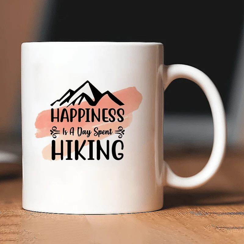 1pc "Happiness is a day of hiking" mountain landscape mug, reusable, suitable for home, office, and everyday drinking cup.
1pc "Happiness is a day of hiking" mountain landscape mug, reusable, suitable for home, office, and everyday drinking cup.
