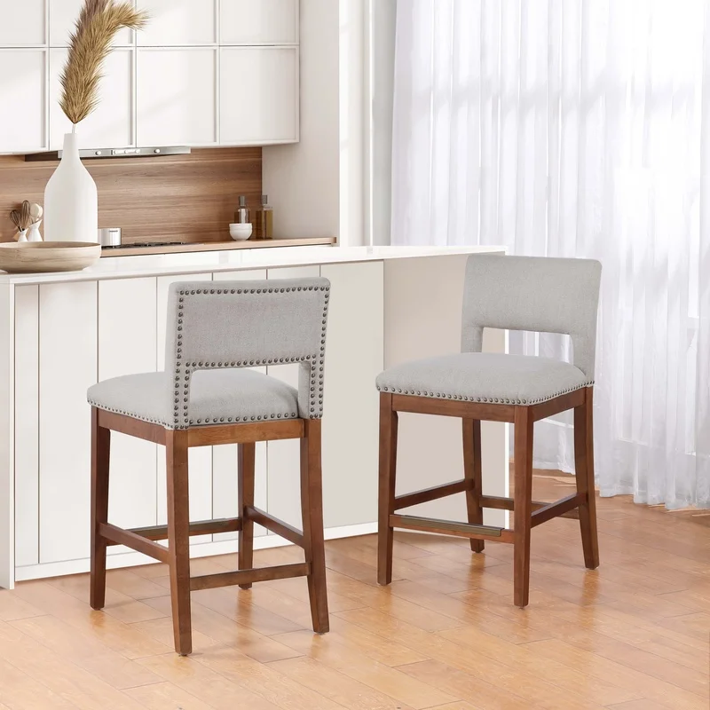 Stud-Decorated Bar Stool with Wooden Legs and Upholstered Seat – 1 Piece
Stud-Decorated Bar Stool with Wooden Legs and Upholstered Seat – 1 Piece