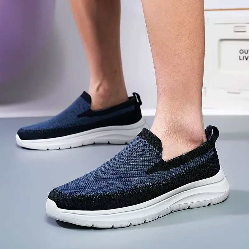 Мужская новая летняя сетчатая повседневная спортивная обувь большого размера с круглым носком, мягкая подошва, нескользящая дышащая легкая прогулочная обувь без шнуровки
Мужская новая летняя сетчатая повседневная спортивная обувь большого размера с круглым носком, мягкая подошва, нескользящая дышащая легкая прогулочная обувь без шнуровки