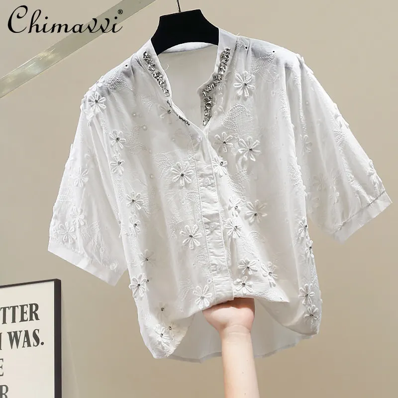 Fashion Heavy Beading Embroider Flowers White Shirt Women's 2026 Summer New V Neck Loose Slimming Elegant Women's Shirt Tops
Fashion Heavy Beading Embroider Flowers White Shirt Women's 2026 Summer New V Neck Loose Slimming Elegant Women's Shirt Tops