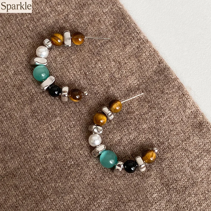Tiger's Eye Color-blocking Multi-element Natural Stone C-shaped Hoop Earrings Light Luxury High-end Earrings Elegant Aesthetic
Tiger's Eye Color-blocking Multi-element Natural Stone C-shaped Hoop Earrings Light Luxury High-end Earrings Elegant Aesthetic