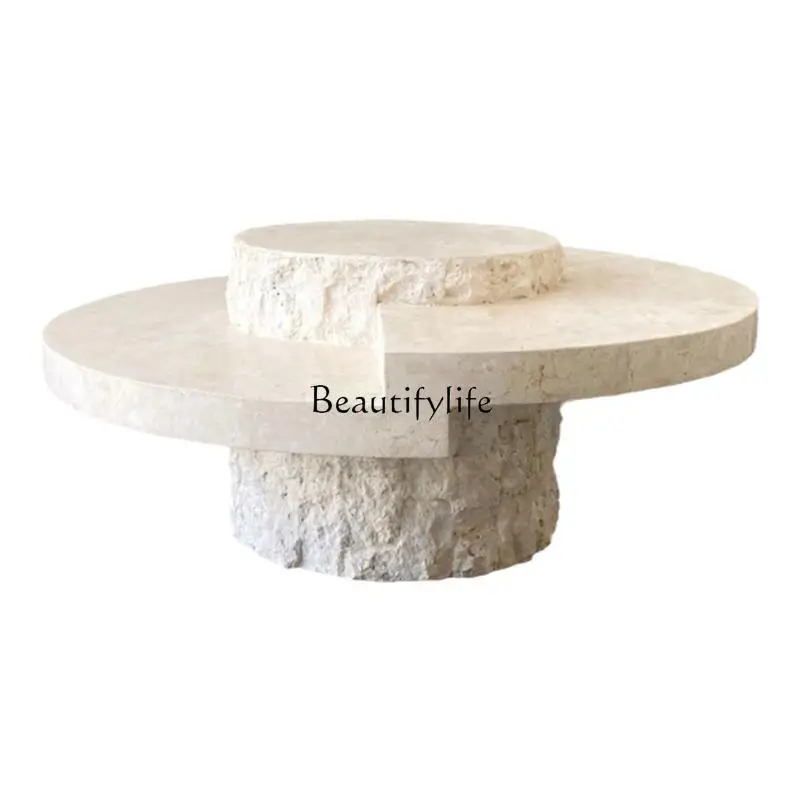 Cream wind tunnel stone designer coffee table creative round wabi-sabi wind light luxury high-end sofa
Cream wind tunnel stone designer coffee table creative round wabi-sabi wind light luxury high-end sofa