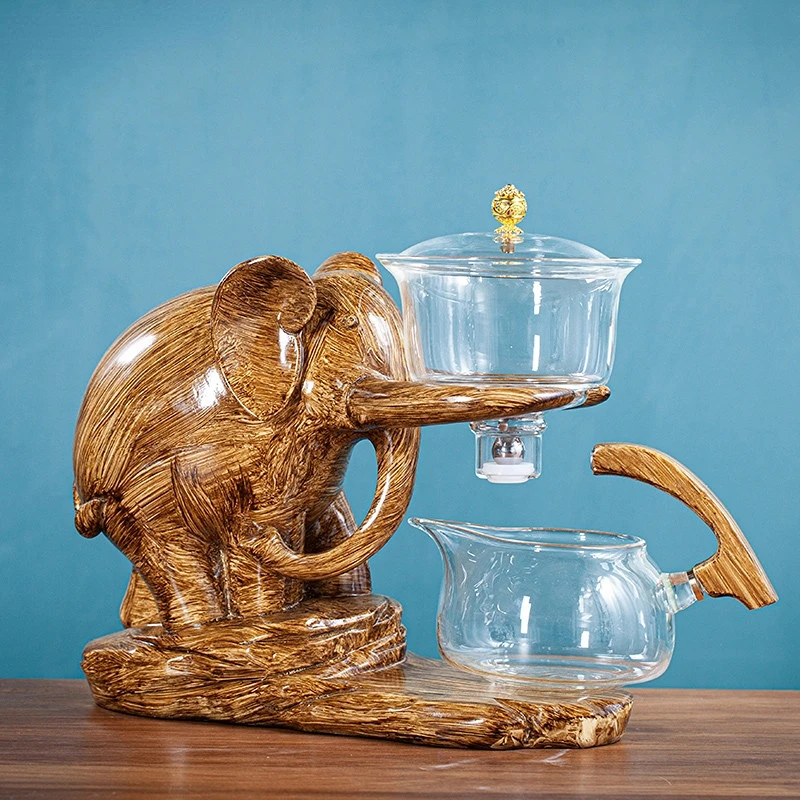 Creative Tea Set Elephant Shape Automatic Tea Set Pu'er Oolong Teapot And Cup Set Heat-resistant Glass Teapot With Base
Creative Tea Set Elephant Shape Automatic Tea Set Pu'er Oolong Teapot And Cup Set Heat-resistant Glass Teapot With Base