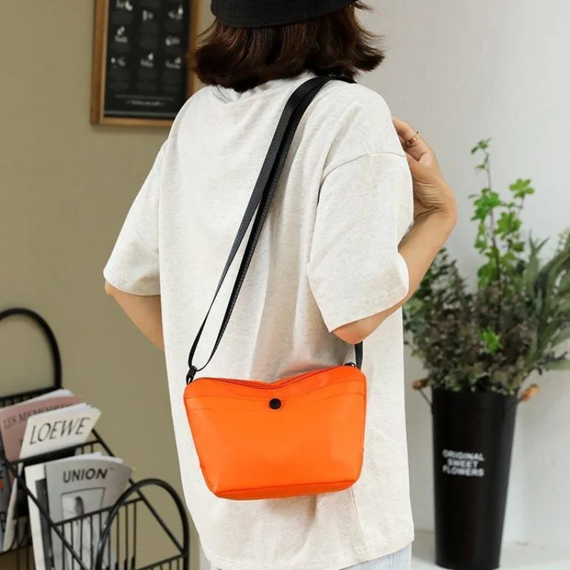 Nylon Dumplings Canvas Bag Female Versatile Crossbody Bags Student Mobile Phone Small Cosmetic Bag Storage Single Shoulder Bag
Nylon Dumplings Canvas Bag Female Versatile Crossbody Bags Student Mobile Phone Small Cosmetic Bag Storage Single Shoulder Bag
