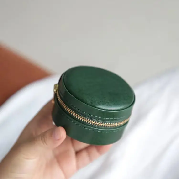 fashion luxury handmade genuine leather women's small round jewelry box simple real cow leather earrings ring storage bag
fashion luxury handmade genuine leather women's small round jewelry box simple real cow leather earrings ring storage bag