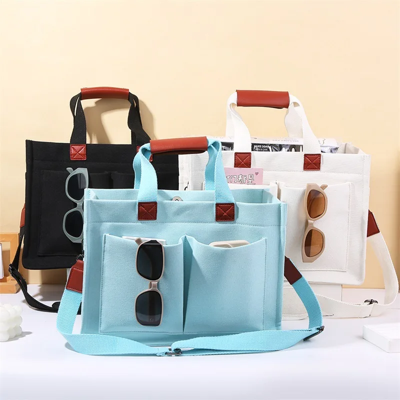 Multi-Pocket Canvas Tote Bag with Adjustable Crossbody Strap, Versatile Shoulder Handbag for Work, School, Travel & Daily Use
Multi-Pocket Canvas Tote Bag with Adjustable Crossbody Strap, Versatile Shoulder Handbag for Work, School, Travel & Daily Use