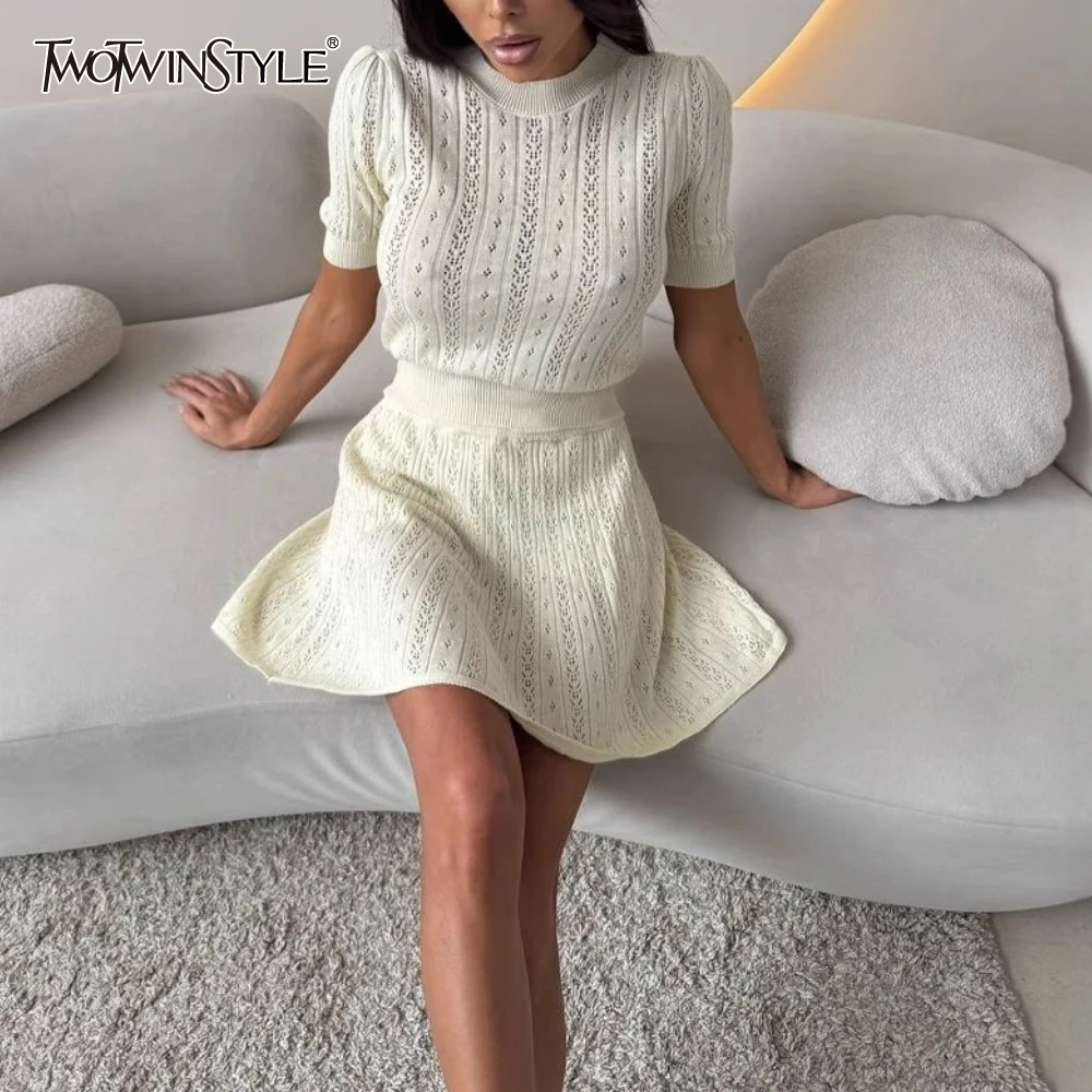 TWOTWINSTYLE Slim Knitted Two Piece Sets for Women O Neck Short Sleeved Top High Mini Waist Skirt Temperament Suit Female Summer
TWOTWINSTYLE Slim Knitted Two Piece Sets for Women O Neck Short Sleeved Top High Mini Waist Skirt Temperament Suit Female Summer