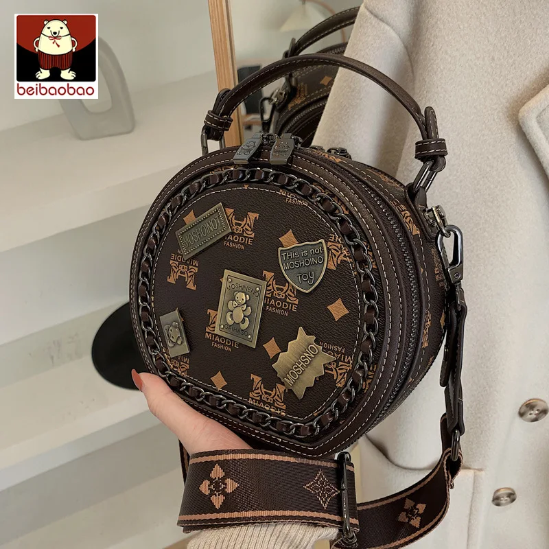 Original brand shoulder bag women's crossbody bag versatile trendy badge fashionable OL small round bag, light luxury handbag
Original brand shoulder bag women's crossbody bag versatile trendy badge fashionable OL small round bag, light luxury handbag
