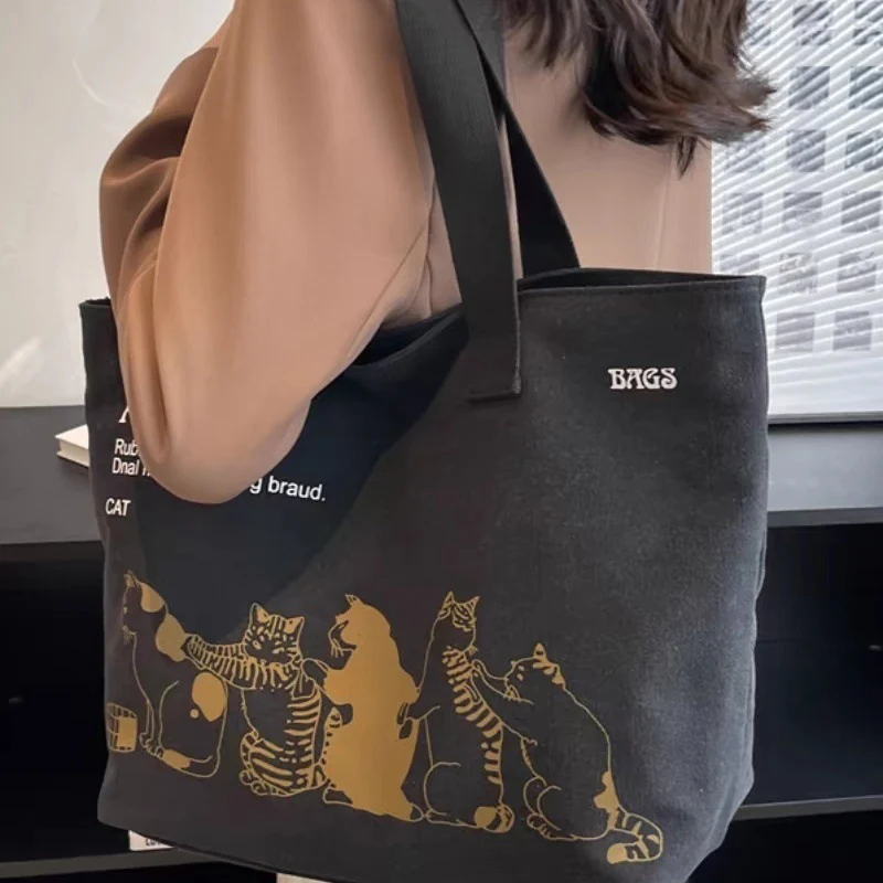 Canvas Large Capacity Storage Handbag Women Tote Anime Cat Letters Shoulder Bags Girls Casual Commute Bag Portable Big Bag
Canvas Large Capacity Storage Handbag Women Tote Anime Cat Letters Shoulder Bags Girls Casual Commute Bag Portable Big Bag