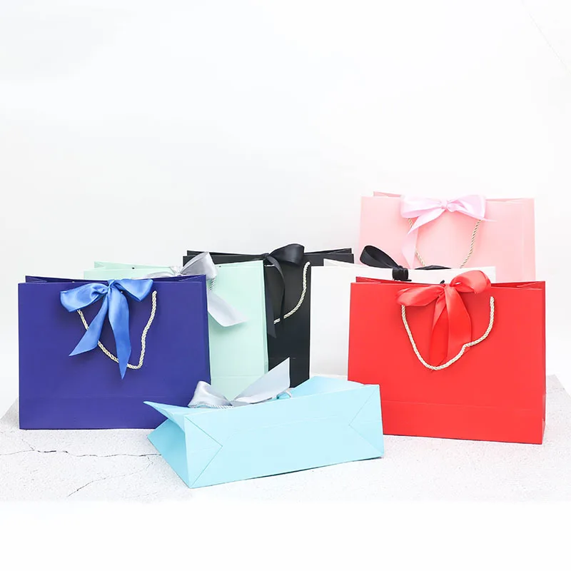 100Pcs/Lot Colorful Paper Shopping Gift Bags With Golden Ribbon Handles For Boutique Shop Party Wedding Favor
100Pcs/Lot Colorful Paper Shopping Gift Bags With Golden Ribbon Handles For Boutique Shop Party Wedding Favor