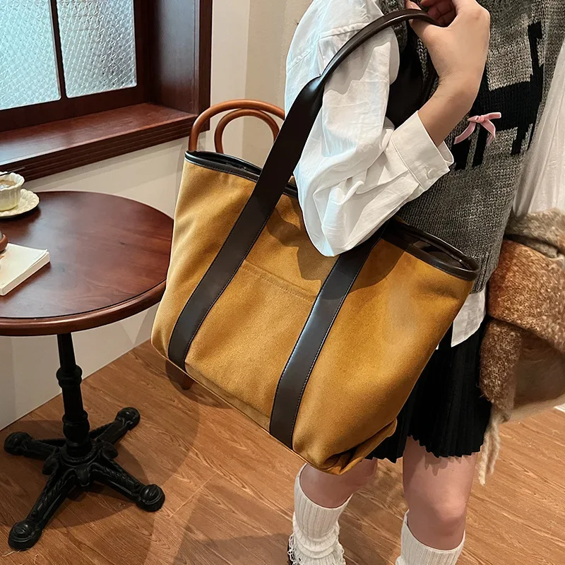 Large-capacity Tote Bag Women's New Autumn and Winter High-end Texture Versatile Niche Retro Suede Portable Messenger Bag
Large-capacity Tote Bag Women's New Autumn and Winter High-end Texture Versatile Niche Retro Suede Portable Messenger Bag