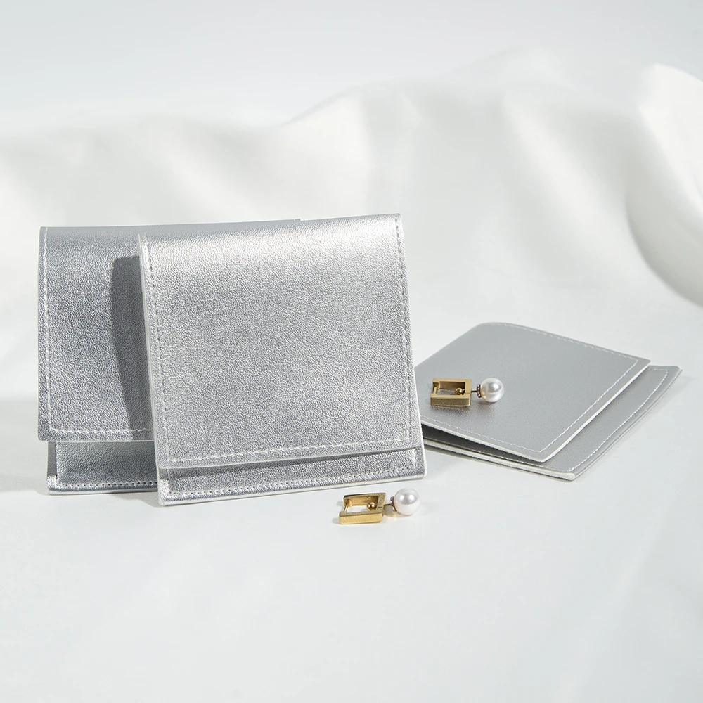 5pcs/lot Bulk Silver PU Leather Earrings Pouches DIY Small Business Bracelet Rings Jewelry Packaging Bag Travel Organizer Case
5pcs/lot Bulk Silver PU Leather Earrings Pouches DIY Small Business Bracelet Rings Jewelry Packaging Bag Travel Organizer Case