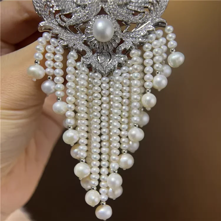 Fresh Water Pearl Golden Plated Cubic Zircon Micro Pave Double phoenix Brooch
Fresh Water Pearl Golden Plated Cubic Zircon Micro Pave Double phoenix Brooch