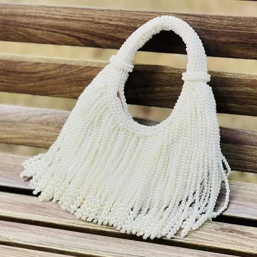 New Internet celebrity versatile light luxury pure heavy handmade beaded full beaded tassel party wedding daily handbag
New Internet celebrity versatile light luxury pure heavy handmade beaded full beaded tassel party wedding daily handbag