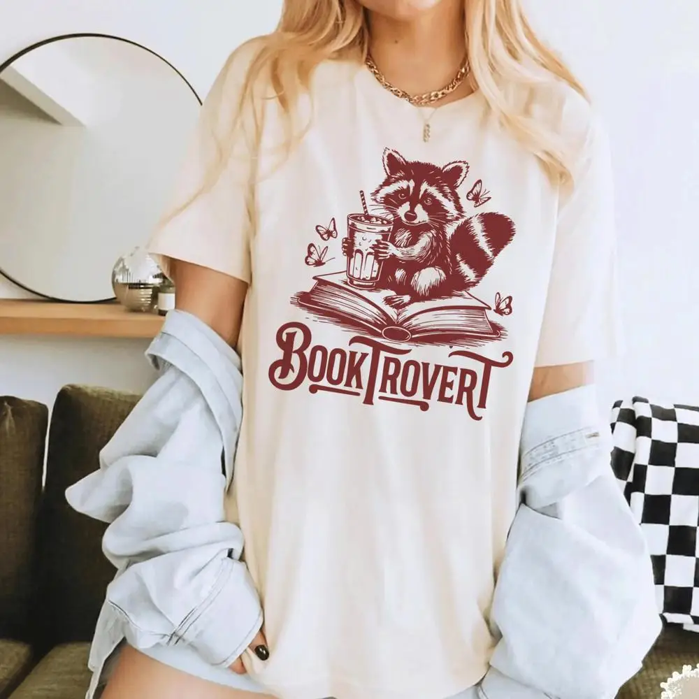 Booktrovert Raccoon Reading Shirt,Retro Bookish Tee,Cute Vintage Reader Shirt,Bookworm Aesthetic Graphic Shirt
Booktrovert Raccoon Reading Shirt,Retro Bookish Tee,Cute Vintage Reader Shirt,Bookworm Aesthetic Graphic Shirt