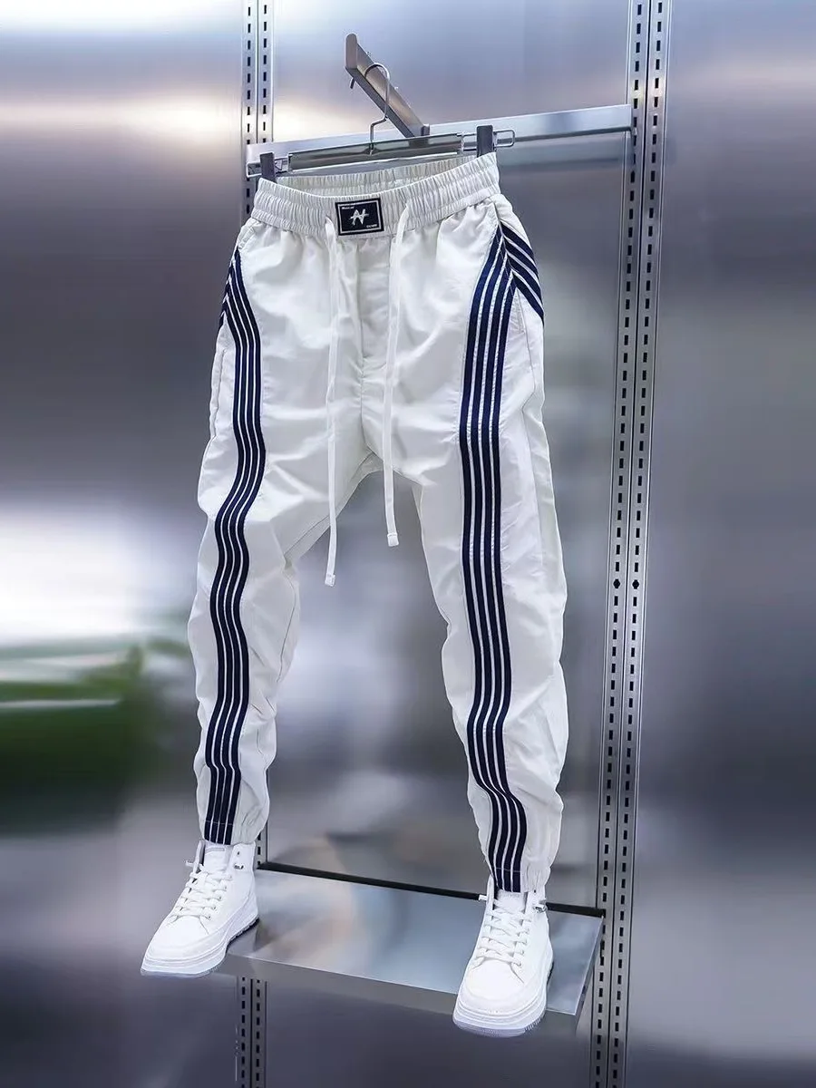 Summer 2026 Men's Ice Silk Quick Dry Slim Fit Casual Pants Trousers Teenagers Versatile Striped Cuffed Leisure Trousers
Summer 2026 Men's Ice Silk Quick Dry Slim Fit Casual Pants Trousers Teenagers Versatile Striped Cuffed Leisure Trousers