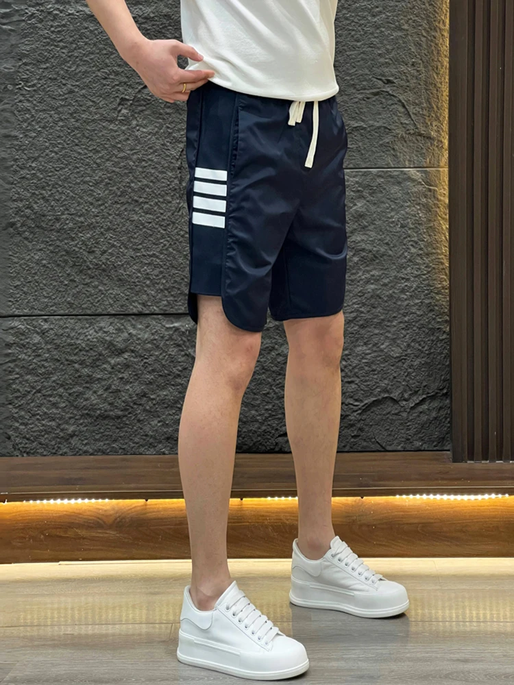 Quick Dry Sports Shorts Men's Summer Thin Fashion Splice Stripe Five-Quarter Comfortable Breathable Casual Beach Pants
Quick Dry Sports Shorts Men's Summer Thin Fashion Splice Stripe Five-Quarter Comfortable Breathable Casual Beach Pants