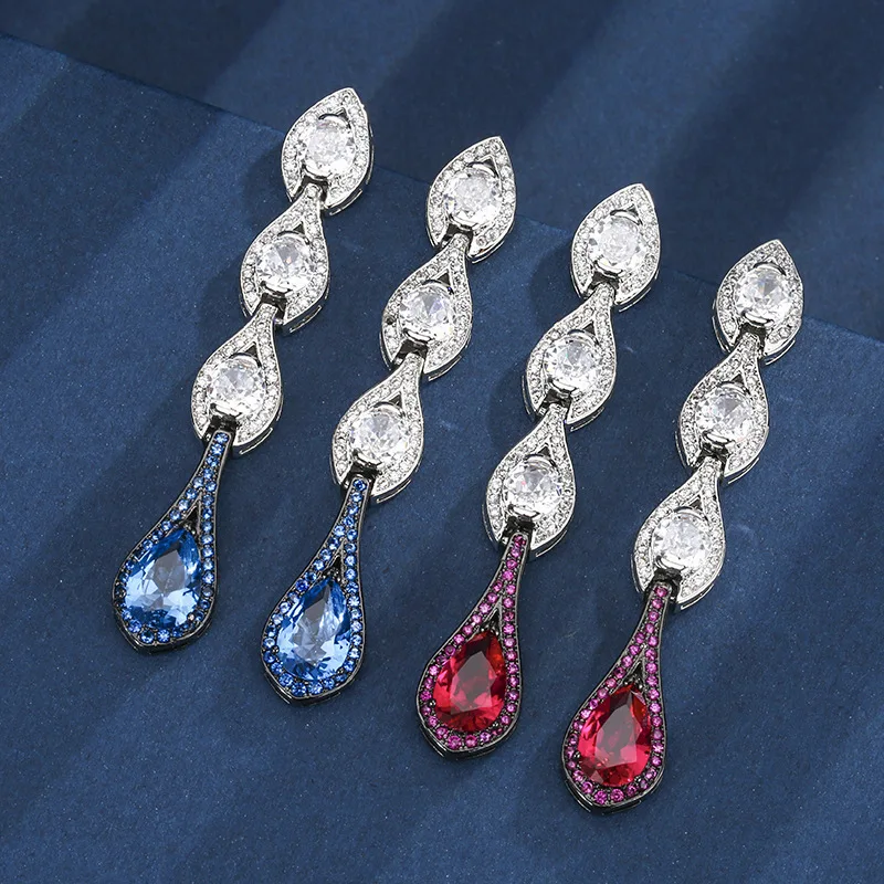 New autumn and winter jewelry: gold-plated copper base with red corundum, blue spinel, and black gold two-tone earrings, stone s
New autumn and winter jewelry: gold-plated copper base with red corundum, blue spinel, and black gold two-tone earrings, stone s