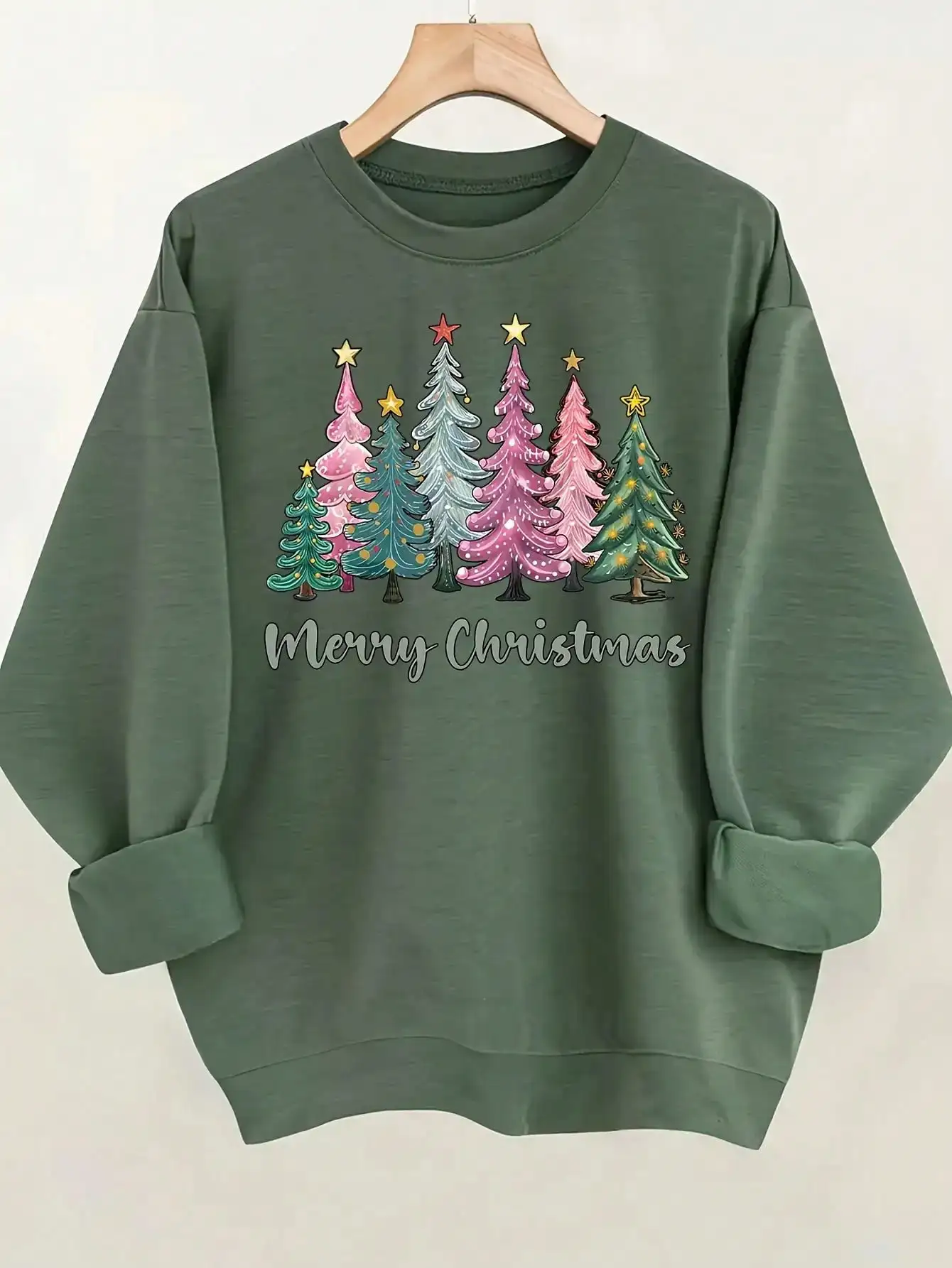 Женская темно-зеленая рождественская толстовка с праздничным принтом «Елка» и надписью «Счастливого Рождества», свободного кроя для зимних праздников
Женская темно-зеленая рождественская толстовка с праздничным принтом «Елка» и надписью «Счастливого Рождества», свободного кроя для зимних праздников