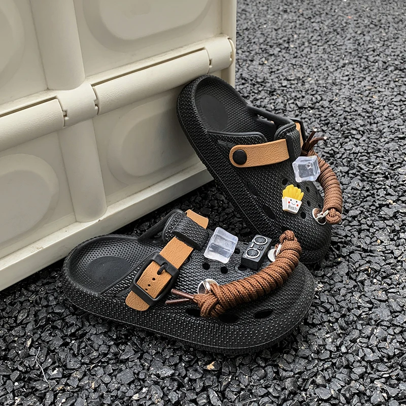 A pair of children's summer sandals, with soft and comfortable soles featuring cartoon patterns and perforated holes. YJ-61101
A pair of children's summer sandals, with soft and comfortable soles featuring cartoon patterns and perforated holes. YJ-61101