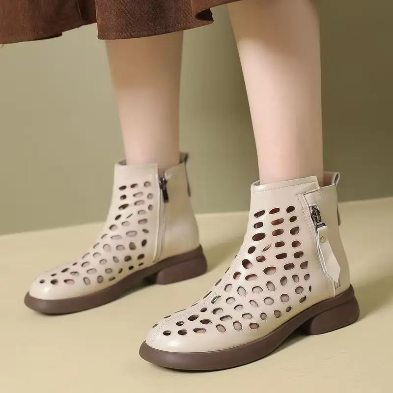 Women Genuine Leather Hollow Out Big Size Cool Boots Spring Summer New Soft Sole Breathable Round Toe Low Heel Cave Ankle Boots
Women Genuine Leather Hollow Out Big Size Cool Boots Spring Summer New Soft Sole Breathable Round Toe Low Heel Cave Ankle Boots