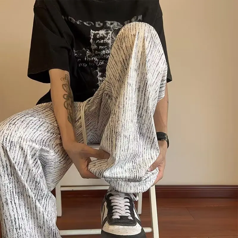 White Ice Silk Men's Loose BF Lazy Sle Wide Leg Pants Summer Thin Straight Drop Waist Casual Trousers Anti-Wrinkle Sportswear
White Ice Silk Men's Loose BF Lazy Sle Wide Leg Pants Summer Thin Straight Drop Waist Casual Trousers Anti-Wrinkle Sportswear