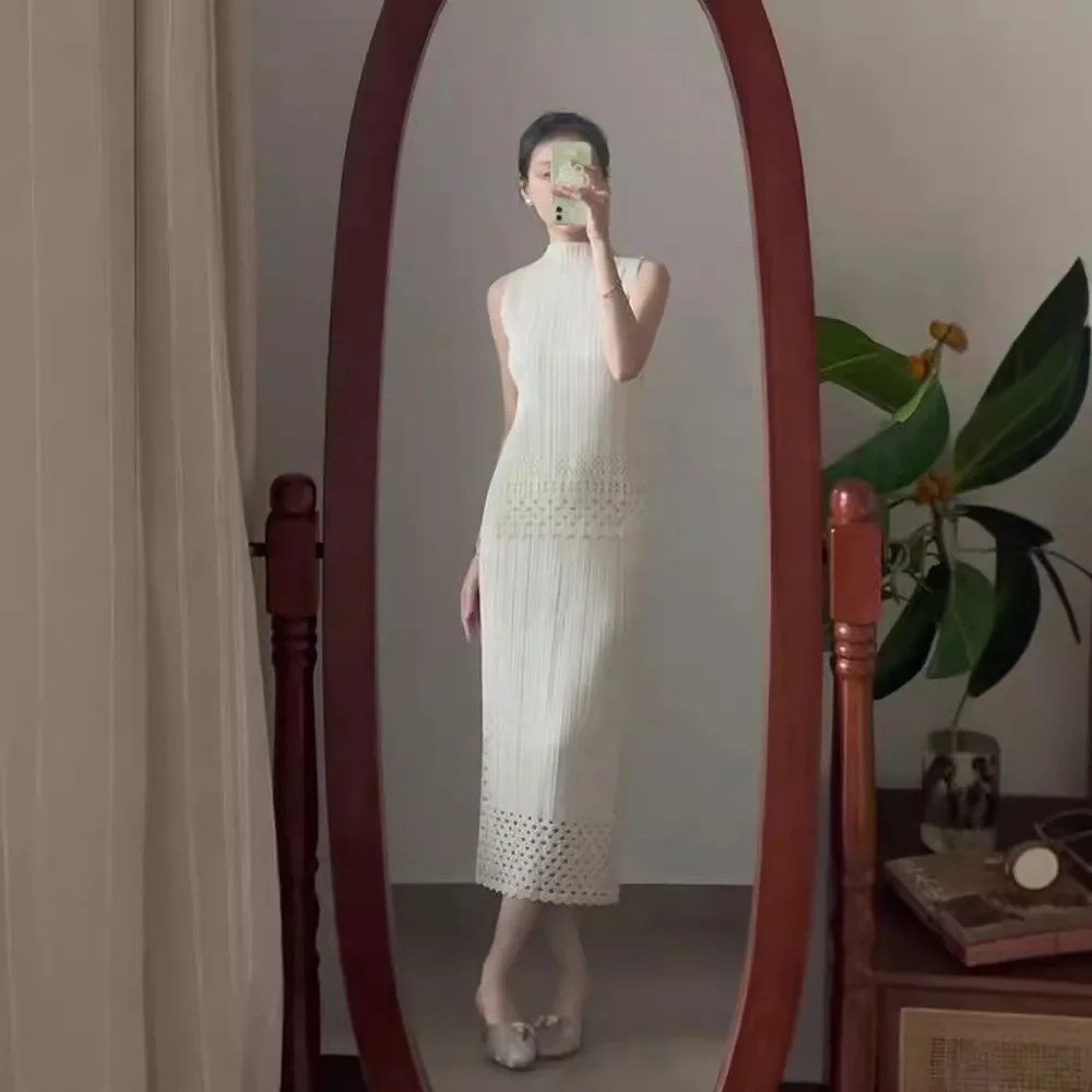 Miyake Slim Women's Suit Round Neck Solid Colour Sleeveless Top High Waist Pleated Half Skirt Two Pieces 2025 Summer New
Miyake Slim Women's Suit Round Neck Solid Colour Sleeveless Top High Waist Pleated Half Skirt Two Pieces 2025 Summer New