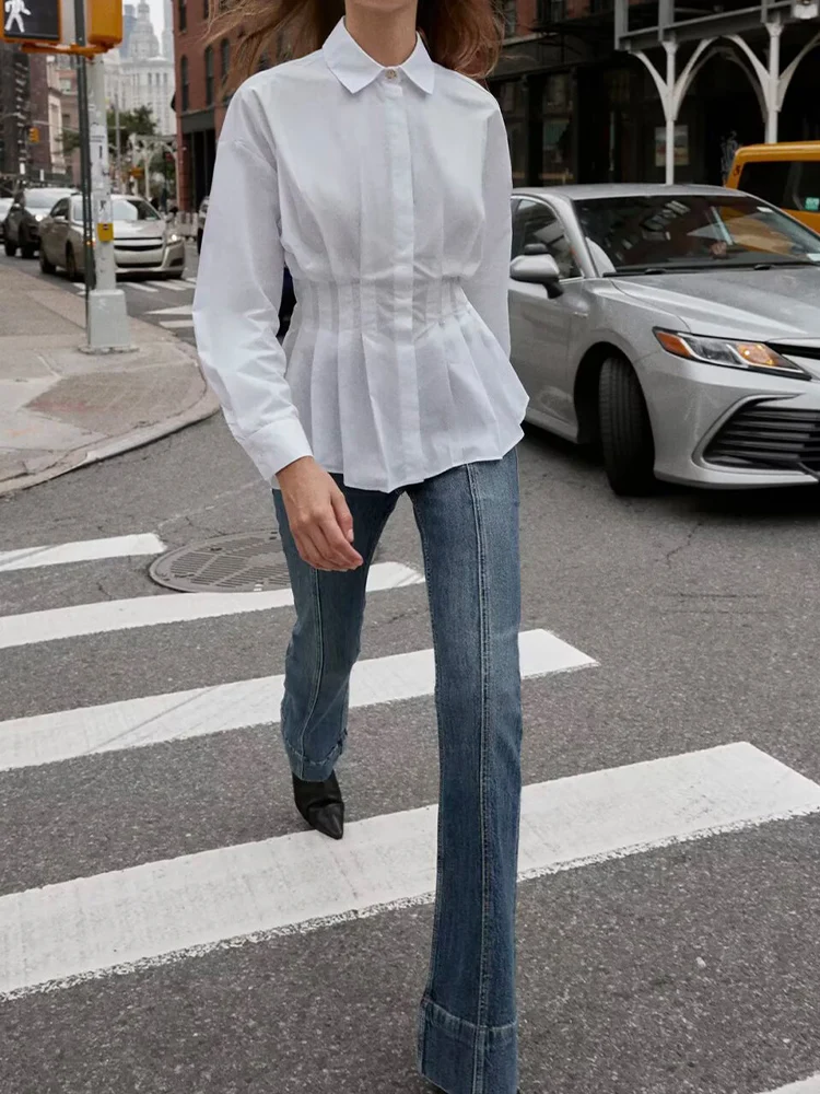 Осенняя новая женская одежда в европейском и американском стиле, дизайн французской талии, белая плиссированная рубашка из поплина с длинными рукавами и лацканами
Осенняя новая женская одежда в европейском и американском стиле, дизайн французской талии, белая плиссированная рубашка из поплина с длинными рукавами и лацканами