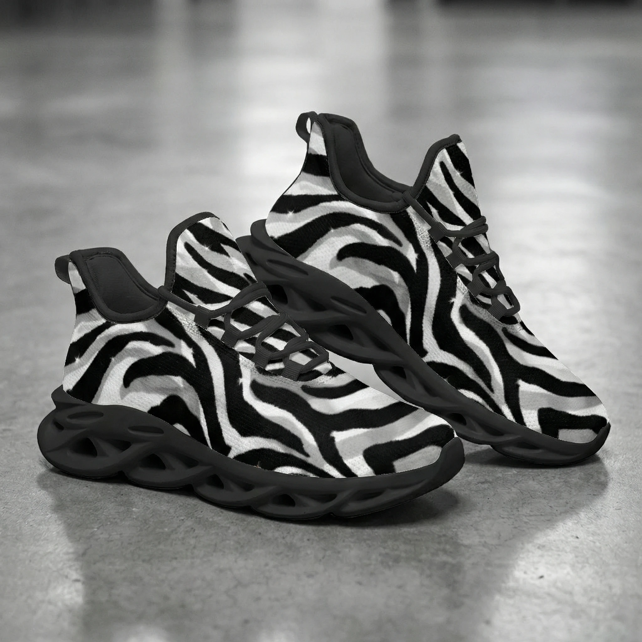 Man and woman casual athletic shoes, featuring a simple black and gray zebra print, comfortable and breathable running shoes.
Man and woman casual athletic shoes, featuring a simple black and gray zebra print, comfortable and breathable running shoes.