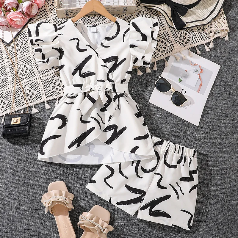 2025 Spring Bestseller Girls V-Neck Printed Set Short Sleeve Top & Shorts Outfit for Big Kids 8-12Years Trendy Casual Playwear
2025 Spring Bestseller Girls V-Neck Printed Set Short Sleeve Top & Shorts Outfit for Big Kids 8-12Years Trendy Casual Playwear