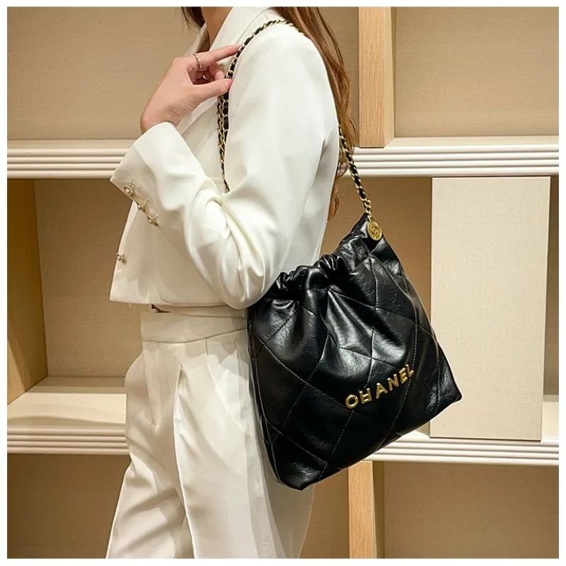 High quality bag, bucket bag, texture, niche, underarm bag, versatile chain, garbage bag, women's bag
High quality bag, bucket bag, texture, niche, underarm bag, versatile chain, garbage bag, women's bag