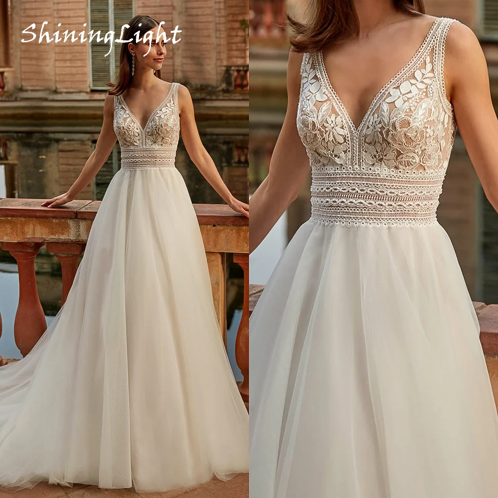 ShiningLight A Line Bohemia Wedding Dresses Sleeveless vestido novia Backless Beach Lace Tulle Bridal Dresses Customized
ShiningLight A Line Bohemia Wedding Dresses Sleeveless vestido novia Backless Beach Lace Tulle Bridal Dresses Customized