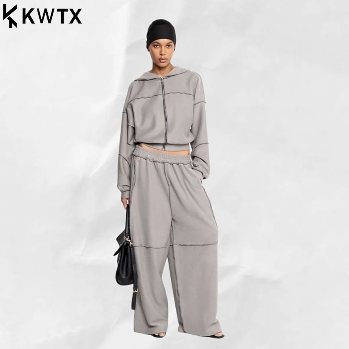 KWTX женский комплект из 2 предметов, короткая куртка на молнии с капюшоном, широкие брюки с эластичной резинкой на талии, весна-лето 2024, городской шикарный дизайнер
KWTX женский комплект из 2 предметов, короткая куртка на молнии с капюшоном, широкие брюки с эластичной резинкой на талии, весна-лето 2024, городской шикарный дизайнер