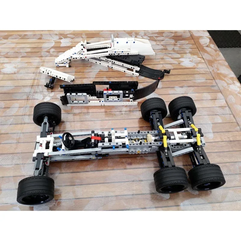 MOC-71117F1 Formula F1 Six Wheeler Building Block Model 796 Parts MOC Creative Boy Kids Birthday Building Block Toy Gift
MOC-71117F1 Formula F1 Six Wheeler Building Block Model 796 Parts MOC Creative Boy Kids Birthday Building Block Toy Gift