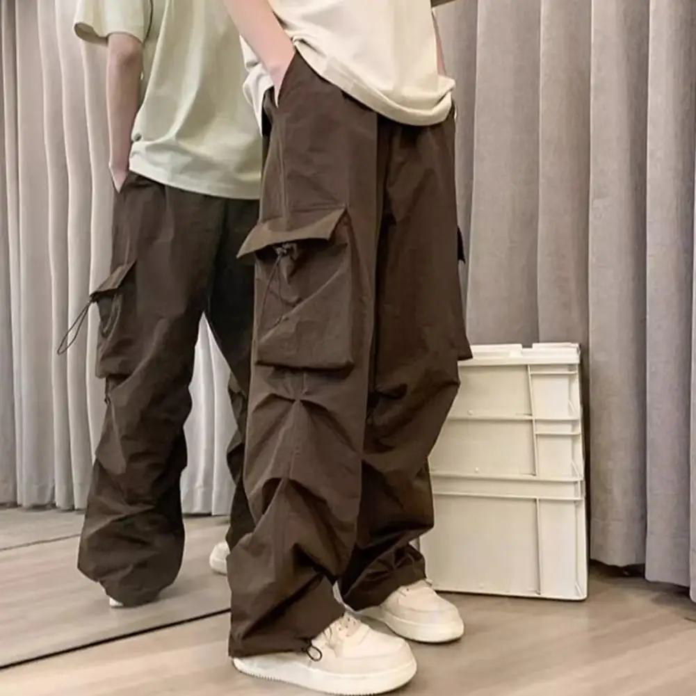 Trousers Solid Color Pants Street Style Men's Cargo Pants with Multiple Pockets Loose Fit Elastic Waist for Hip Hop Fashion
Trousers Solid Color Pants Street Style Men's Cargo Pants with Multiple Pockets Loose Fit Elastic Waist for Hip Hop Fashion