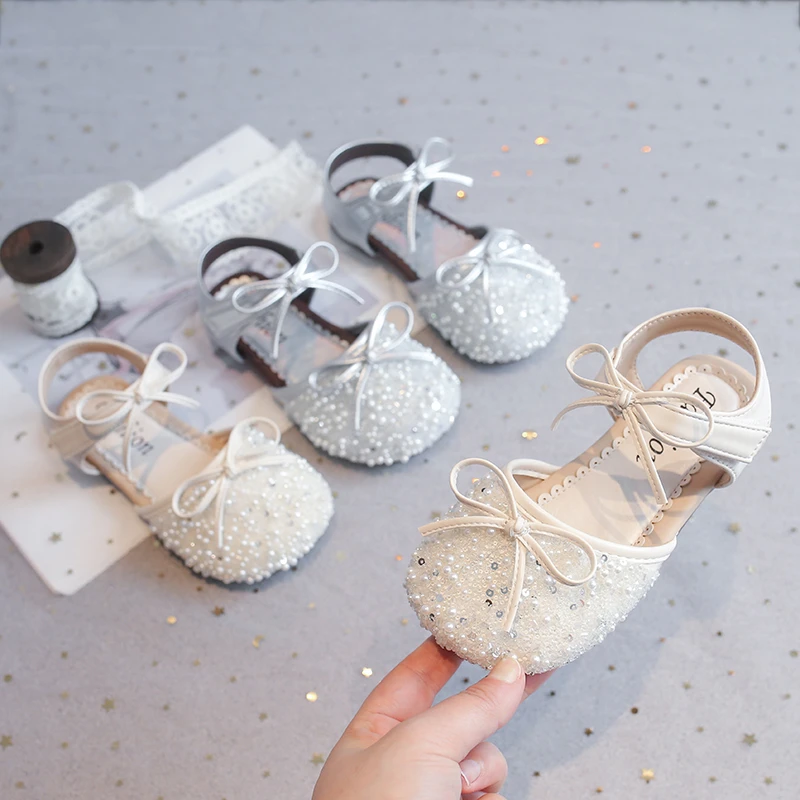 Glitter Beaded Leather Sandals with Cute Bow 2026 New Summer Kids Mary Jane Shoes Soft Sole Princess School Party Wedding Shoes
Glitter Beaded Leather Sandals with Cute Bow 2026 New Summer Kids Mary Jane Shoes Soft Sole Princess School Party Wedding Shoes