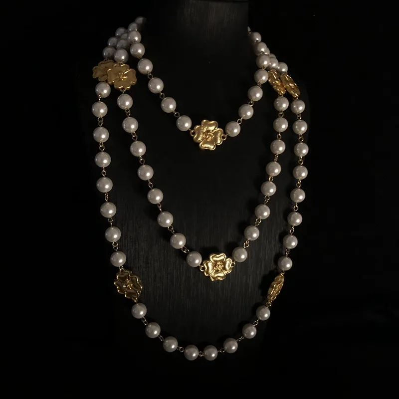 Medieval Old Retro Gold Necklace Four-leaf Flower Glazed Pearl Heavy Industry Long Short Sweater Chain
Medieval Old Retro Gold Necklace Four-leaf Flower Glazed Pearl Heavy Industry Long Short Sweater Chain